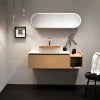 スペインBATHCOの陶器洗面ボウル「WADI Orange」。鮮やかなオレンジの内側とベージュグレーの外側のコントラストが印象的で、空間にぬくもりと彩りを添えるデザイン。オーバル型と釉薬の艶感が美しく調和し、住宅から商業空間まで幅広く活躍します。